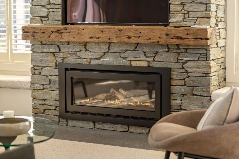 stone feature fireplace jack's point show home fowler homes queentown 53