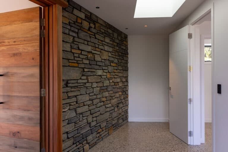 feature stone wall nereus way glenorchy fowler homes queenstown 68